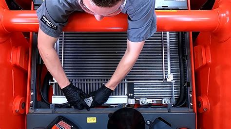 skid steer losing coolant|763 drains coolant thru top of overflow bottle .